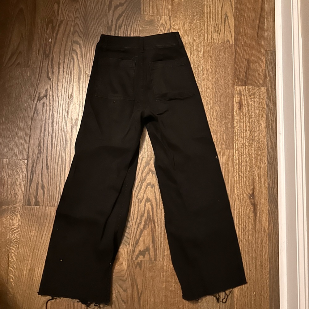 Wide leg pants. These are high waist and they cut off above the ankle.